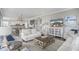Open-concept living space with stylish furnishings and abundant natural light at 1907 S Waccamaw Dr., Garden City Beach, SC 29576