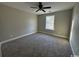 Well-lit bedroom featuring carpet flooring at 2260 Pearl Rd., Galivants Ferry, SC 29544