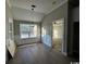 Bright dining room with wainscoting and hardwood floors at 2260 Pearl Rd., Galivants Ferry, SC 29544