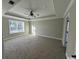 Spacious main bedroom with tray ceiling and carpet at 2260 Pearl Rd., Galivants Ferry, SC 29544