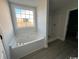 Main bathroom with garden tub, shower, and vinyl flooring at 2264 Pearl Rd., Galivants Ferry, SC 29544