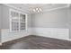 Elegant dining room with chair railing and hardwood floors at 2264 Pearl Rd., Galivants Ferry, SC 29544