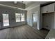 Formal dining room with chair rail, hardwood floors, and access to the kitchen at 2264 Pearl Rd., Galivants Ferry, SC 29544