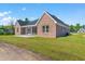 Exterior view of charming brick home with screened porch at 2264 Pearl Rd., Galivants Ferry, SC 29544