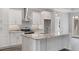 Modern kitchen with granite countertops and white cabinets at 2264 Pearl Rd., Galivants Ferry, SC 29544