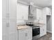 Bright kitchen featuring white cabinets and granite countertops at 2264 Pearl Rd., Galivants Ferry, SC 29544