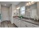 Elegant bathroom with double vanity and granite countertop at 313 Mayflower Dr., Calabash, NC 28467