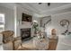 Living room with fireplace and built-in seating at 313 Mayflower Dr., Calabash, NC 28467