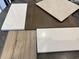 Samples of kitchen cabinet colors and countertop materials at 714 Night Lotus Dr., Calabash, NC 28467