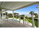 View from the deck overlooking the lush landscaping and ocean at 8000 Beach Dr., Myrtle Beach, SC 29572