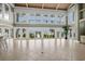 Open living area with expansive ocean views, tile flooring, and high ceilings at 8000 Beach Dr., Myrtle Beach, SC 29572