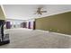 Spacious living room with ample natural light and neutral carpet at 8000 Beach Dr., Myrtle Beach, SC 29572