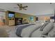 Bright and spacious main bedroom with views, fireplace and seating area at 8000 Beach Dr., Myrtle Beach, SC 29572