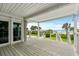 Relaxing outdoor patio with views of the landscaped backyard and the serene beach at 8000 Beach Dr., Myrtle Beach, SC 29572