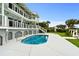 Inviting backyard pool and patio area of this multi-story home at 8000 Beach Dr., Myrtle Beach, SC 29572