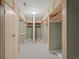 Large walk-in closet with custom shelving and ample storage at 8000 Beach Dr., Myrtle Beach, SC 29572
