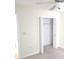 A bedroom closet with white walls and a ceiling fan with carpet at 1573 Southwood Dr., Surfside Beach, SC 29575