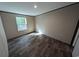 Bedroom with wood-look floors, and window at 2500 Newton Rd., Aynor, SC 29511