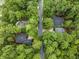Aerial view of a house surrounded by lush trees and greenery at 1237 Clipper Rd., North Myrtle Beach, SC 29582