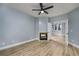 Bedroom featuring a fireplace and entry to another room at 1237 Clipper Rd., North Myrtle Beach, SC 29582
