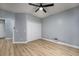 Bedroom with ceiling fan, wood floors, and closet at 1237 Clipper Rd., North Myrtle Beach, SC 29582