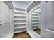 Walk-in closet features built-in shelving for ample storage at 1237 Clipper Rd., North Myrtle Beach, SC 29582