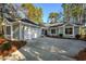 Gray house with two-car garage and nicely landscaped yard at 1237 Clipper Rd., North Myrtle Beach, SC 29582