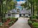 Charming single-story home with an attached garage and well-manicured landscaping at 1237 Clipper Rd., North Myrtle Beach, SC 29582