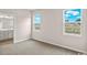 Spacious bedroom featuring plenty of natural light and an ensuite bathroom at 3038 Deerberry Place, Longs, SC 29568