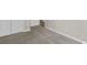 This spacious bedroom is carpeted with neutral colors and double doors at 3038 Deerberry Place, Longs, SC 29568