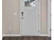 The property's front entry features a white door with glass, and modern hardware at 3038 Deerberry Place, Longs, SC 29568