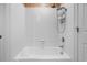 A white tiled shower and tub combo at 4569 Carriage Run Circle, Murrells Inlet, SC 29576