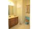 Bathroom featuring oak vanity, seashell decoration, and light blue toilet, combining style and comfort at 5864 Crestwood Dr., Myrtle Beach, SC 29578