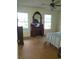 Bedroom featuring a large vanity, window views, and a ceiling fan at 5864 Crestwood Dr., Myrtle Beach, SC 29578