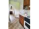 Functional kitchen with wood cabinetry and updated appliances, perfect for cooking and entertaining at 5864 Crestwood Dr., Myrtle Beach, SC 29578