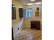 Functional laundry room area with storage cabinets, wooden desk, and a window view at 5864 Crestwood Dr., Myrtle Beach, SC 29578
