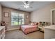 Charming bedroom with a window, plush carpet, and a playful atmosphere at 1055 Academy Dr., Conway, SC 29526