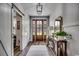 Bright entryway with hardwood floors, barn door, and console table at 1055 Academy Dr., Conway, SC 29526