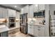 Stainless steel appliances and white cabinets in this well-equipped kitchen at 1055 Academy Dr., Conway, SC 29526