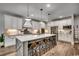 Modern kitchen with large island, white cabinets and stainless steel appliances at 1055 Academy Dr., Conway, SC 29526