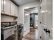 Functional laundry room with ample storage and a view into a guitar room at 1055 Academy Dr., Conway, SC 29526