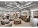 Open living room and kitchen with hardwood floors and coffered ceiling at 1055 Academy Dr., Conway, SC 29526