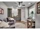 Home office with built-in green cabinets and wood desk at 1055 Academy Dr., Conway, SC 29526