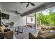 Relaxing covered porch with wicker furniture and a view of the backyard at 1055 Academy Dr., Conway, SC 29526