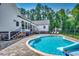 Stunning pool with waterslide, spacious patio, and partial house view at 1055 Academy Dr., Conway, SC 29526