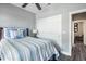 Bedroom with sliding barn doors and access to another room at 1926 Bluff Dr., Myrtle Beach, SC 29577