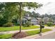 House exterior, featuring gray siding, landscaping, and a two-car garage at 1926 Bluff Dr., Myrtle Beach, SC 29577