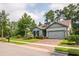 Single story home with gray siding, landscaping, and a two-car garage at 1926 Bluff Dr., Myrtle Beach, SC 29577