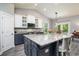 Spacious kitchen island with granite countertop, breakfast bar and stainless steel appliances at 1926 Bluff Dr., Myrtle Beach, SC 29577