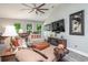 Living room with large TV, fireplace, and comfortable seating area at 1926 Bluff Dr., Myrtle Beach, SC 29577